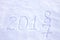 New years date 2018 written in snow background.