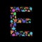 New Years font. The letter E cut out of black paper on the background of bright colored stars of different sizes. Set of New Year
