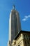 NEW YORK - AUGUST 25, 2018: Landmark Empire State and surrounding buildings in midtown Manhattan on night of Sept. 13, 2012.