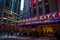 New York, Broadway streets at night. Radio city entrance, colorful neon lights