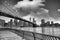 New York. Brookyn Bridge and Manhattan skyline at summer sunset