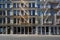 New York building facades with stairs, empty street