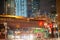 New York City - December 3rd, 2018: Lincoln Tunnel Expressway entrance with city traffic and buildings at night