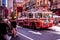 New York City Fire Truck Riding Through Crowd in the 8th avenue , Manhattan , New York City . NY 08/04/2018