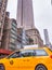 NEW YORK CITY - JUNE 11, 2013: Manhattan traffic on a hot sunny day in front of Empire State Building