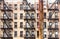 New York City old apartment building with rusted pipes