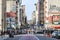 New York City: The sidewalks of Canal Street and Broadway are crowded with people shopping along the sidewalks