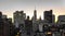 New York City skyline buildings nighttime view with glowing lights in the windows of apartments and offices in lower Manhattan