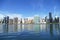 New York City Skyline, East River and Manhattan, New York waterfront on a sunny day with blue sky in the background