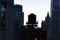 New York City skyline with silhouette of water tower