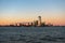 New York city skyline sunset view from the boat to Ellis Island