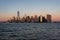 New York city skyline sunset view from the boat to Ellis Island