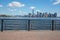 New York city skyline view and Ellis Island from dock terrace