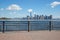 New York city skyline view from empty dock with railing