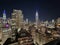 New York city skyscrapers at night with empire state view building  seen from a rooftop bar