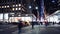 NEW YORK CITY, USA - DECEMBER 7, 2018: Avenue of the America with people and traffic at night, Manhattan, New York City