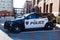 New York City, USA - March 25, 2024: Dodge Durango Police vehicle parked outdoor, side view