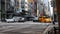 NEW YORK CITY, USA - September 3, 2018: Rush hour traffic on busy road in manhattan. Classic yellow taxi cab. Tourist