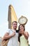 New York couple taking tourist selfie Flatiron NYC