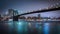 New York Manhatten Skyline by Night with brooklyn bridge
