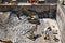 New York, New York: Workers watch as heavy machinery breaks up the Manhattan schist bedrock