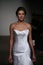 NEW YORK, NY - OCTOBER 12: A model walks the runway at the Anna Maier Ulla-Maija Couture Fall 2014 Bridal collection show