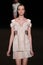 NEW YORK, NY - SEPTEMBER 04: A model walks the runway at the Meskita fashion show