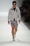 NEW YORK, NY - SEPTEMBER 06: A model walks the runway at the Nautica Men\'s Spring 2014 fashion show