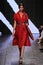 NEW YORK, NY - SEPTEMBER 08: Model Imaan Hammam walks the runway at Donna Karan Spring 2015 fashion show