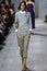 NEW YORK, NY - SEPTEMBER 10: A model walks the runway at Michael Kors Spring 2015 fashion collection