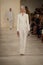 NEW YORK, NY - SEPTEMBER 11: A model walks the runway at Ralph Lauren fashion show