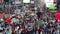 New York, NY, USA. Close up of thousands of people walking in Time Square, Broadway and on the seventh Avenue. Aerial view