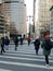 New York, NY, USA - January 21, 2020: Commuters crossing near Park Row and Broadway head to work