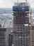 New York, NY, USA. New skyscrapers under construction. Construction site with cranes, elevators and scaffolding