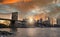 New york skyline from Brooklyn bridge at sunset with moon