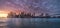 New york skyline reflection on the Hudson river at Brooklyn bridge at sunset