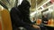 New York underground, a man on the train is sleeping, public transportation