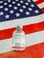 New york,United States of America 10 Jun 2022:A bottle of monkey pox vaccine (MPXV) placed on the United States flag.