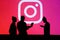 NEW YORK, USA, 25. MAY 2020: Instagram photo and video-sharing social networking service Group of business people chat on mobile