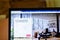 New York, USA - 9 April 2020: Airbnb.com website on laptop screen close up. Man using service on display, blurry