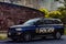 New York, USA June 1, 2023: Beautiful photograph of an official NYPD patrol car, with the Big Apple skyline and Manhattan.