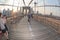 NEW YORK - USA - JUNE, 12 2015 people crossing manhattan bridge