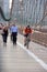 NEW YORK - USA - JUNE, 12 2015 people crossing manhattan bridge