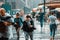 New York, USA - June 16, 2017: Downtown New York City on a rainy day. East 42nd strret, NY - people running through the rain