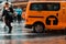 New York, USA - June 16, 2017: Downtown New York City on a rainy day. East 42nd strret, NY - people running through the rain