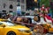 New York, USA - June 6, 2019:  Horse and carriage drives in traffic down Central Park West in Manhattan - image