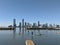 New York, USA - March 21 2021: A group of people on kayaks and paddle boards on Hudson River with a view of New Jersey