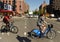 New York, USA - May 24, 2018: People go on the bicycles on street of Manhattan in New York