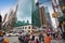 New York, USA â€“ August 20, 2018: Busy sidewalk at the intersection 6th Avenue and 42nd Street near at Bryant Park with traffic