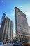 New York, USA â€“ August 23, 2018: Busy sidewalk at the intersection 5th Avenue and E 23rd Street next to Flatiron building with